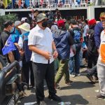 Komisioner Kompolnas Pudji Hartanto Iskandar di Pos Pengamanan Komisi Pemilihan Umum (KPU), Jakarta Pusat, Kamis (19/10/23).